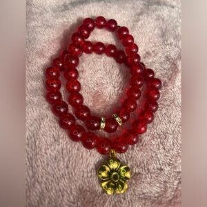 Read bead bracelet set with flower charm
